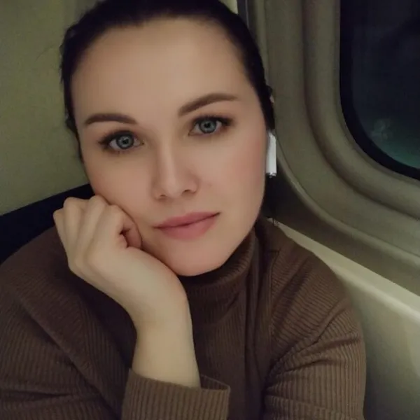 Мила
